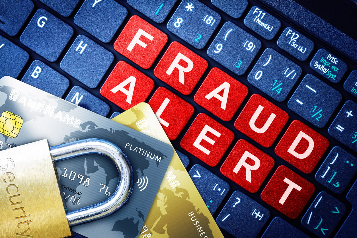 Fraud Alert signage on keyboard