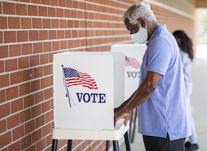 Man voting in an election.