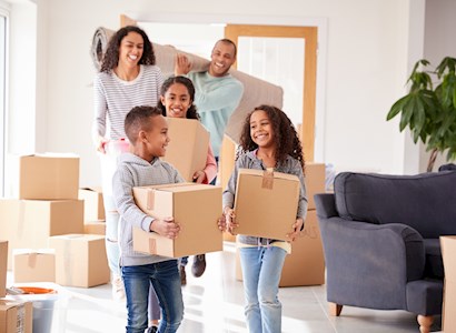 A family moves into their house.