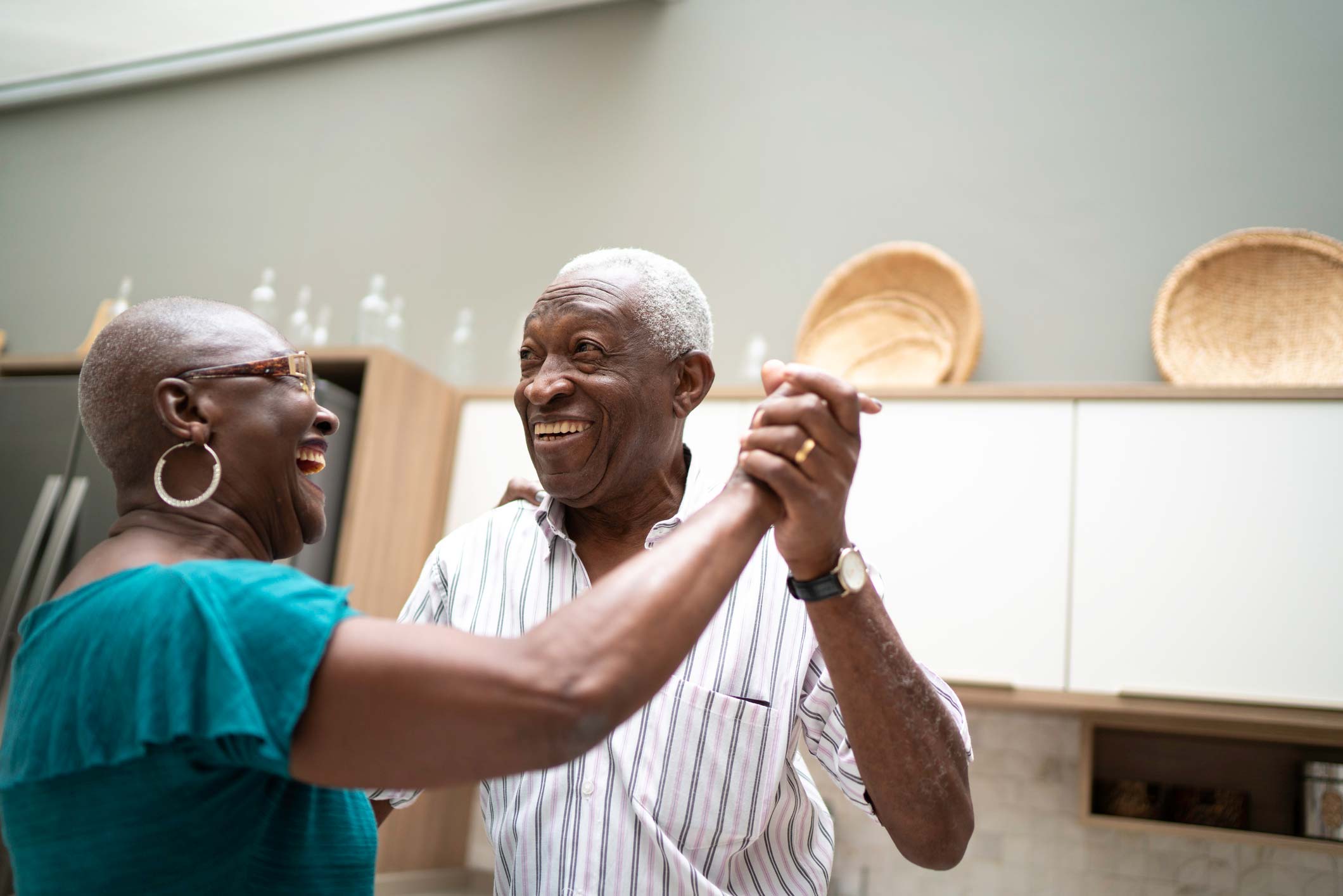 Older couple dancing together