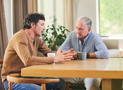 Son talking with dad