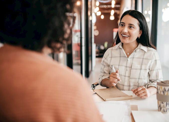 Woman talking with her financial planner