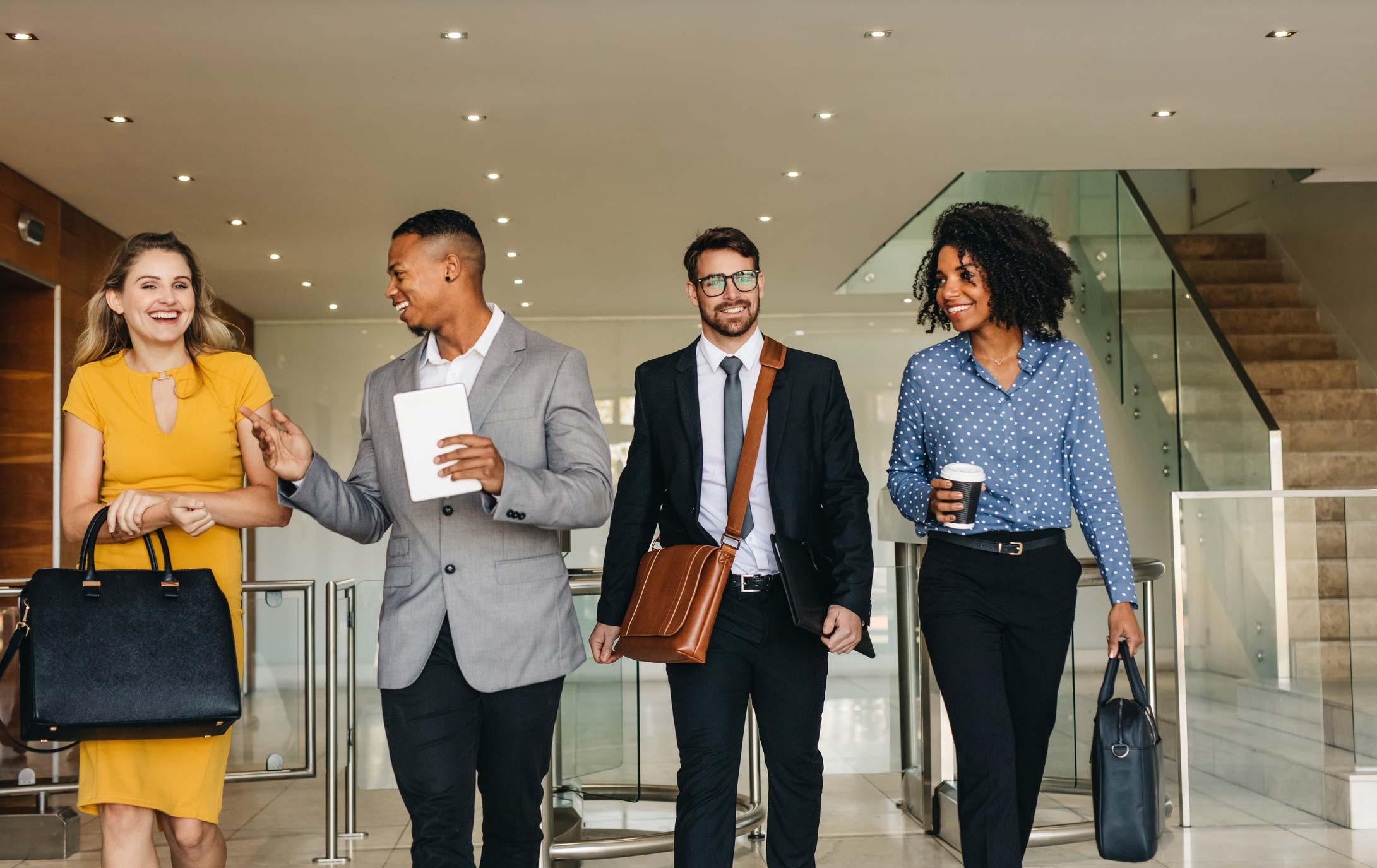 Young businesspeople walking in a hallway