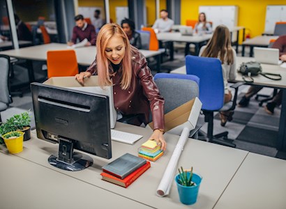 Multi-ethnic group of people, millenials working in big modern office all together, one woman is first day at work